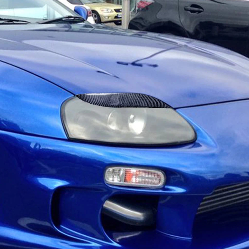 Toyota Supra Real Dry Carbon Front Headlight Eyelids JZA80